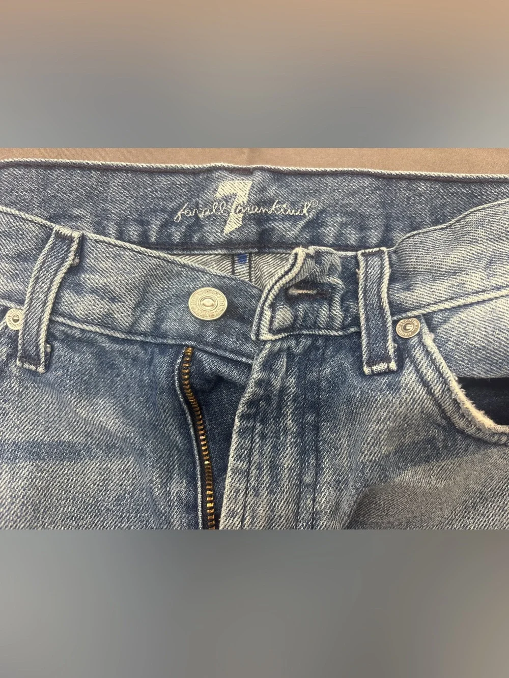 7 For All Mankind Light Blue High-Rise Cutoff Denim Shorts